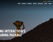 Picture of woman walking holding a parcel