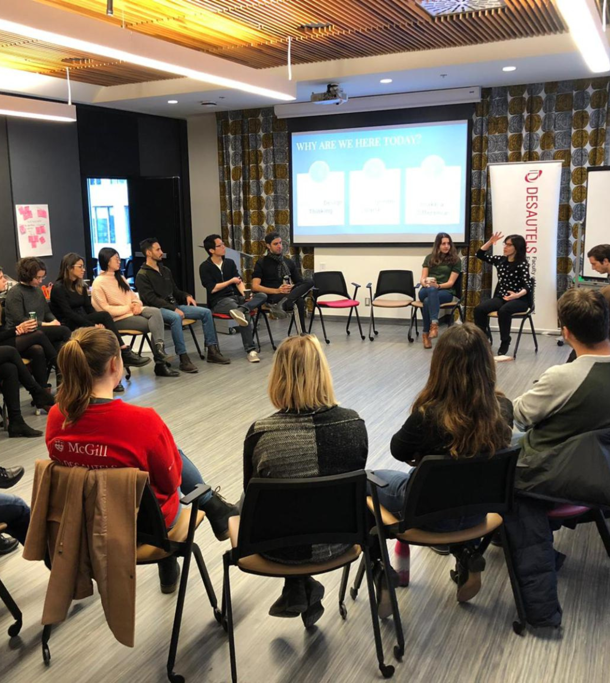 Photo of a group of training participants around a circle