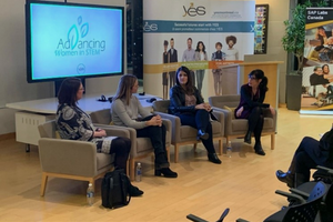 Panel of four women, sitting in front of audience, for YES Advancing Women in Stem.